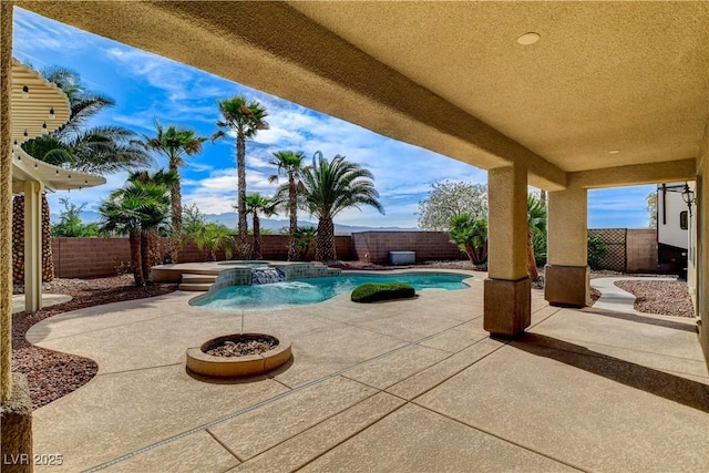 5949 Casa Coronado Ave, Las Vegas, NV 89131 - view of swimming pool with a patio, a pool with connected hot tub, and a fenced backyard
