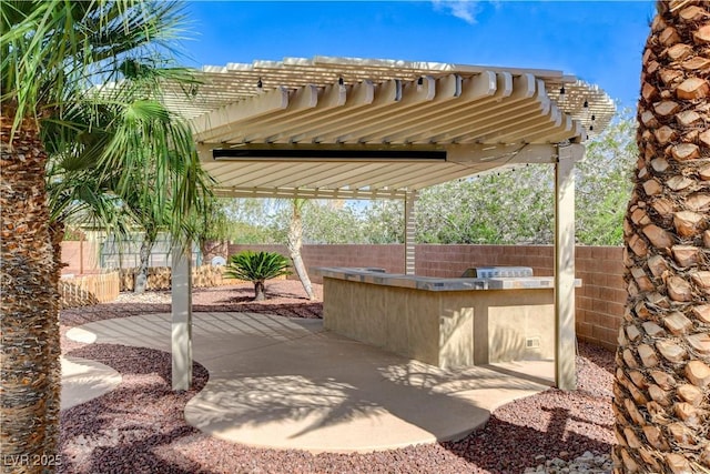 5949 Casa Coronado Ave, Las Vegas, NV 89131 - fenced backyard featuring a pergola, a patio area, and area for grilling