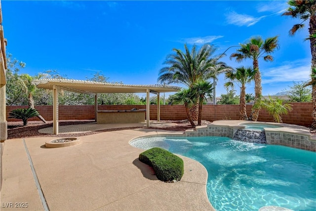 5949 Casa Coronado Ave, Las Vegas, NV 89131 - view of swimming pool with an in-ground hot tub, a fenced backyard, and a patio