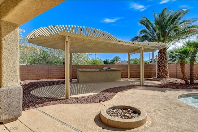 5949 Casa Coronado Ave, Las Vegas, NV 89131 - fenced backyard featuring a patio area, a pergola, and area for grilling