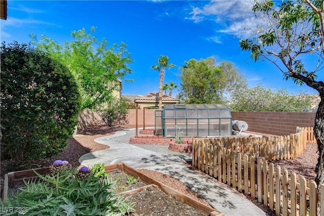 5949 Casa Coronado Ave, Las Vegas, NV 89131 - fenced backyard featuring an exterior structure and an outdoor structure