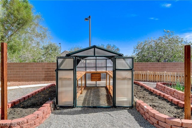 5949 Casa Coronado Ave, Las Vegas, NV 89131 - view of greenhouse with a fenced backyard