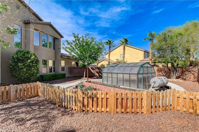 5949 Casa Coronado Ave, Las Vegas, NV 89131 - fenced backyard with an exterior structure and an outdoor structure