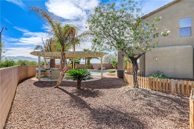 5949 Casa Coronado Ave, Las Vegas, NV 89131 - fenced backyard with a pergola and a patio