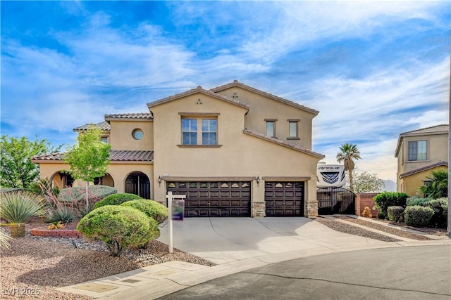 5949 Casa Coronado Ave, Las Vegas, NV 89131 - mediterranean / spanish-style home featuring a garage, a tile roof, stucco siding, concrete driveway, and a gate