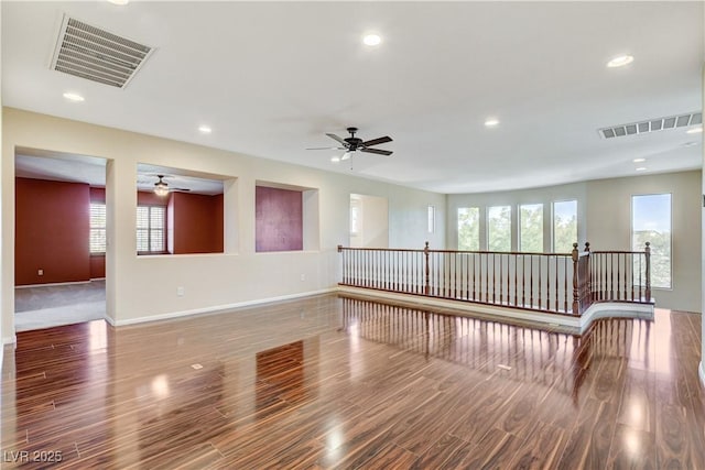5949 Casa Coronado Ave, Las Vegas, NV 89131 - spare room with a ceiling fan, healthy amount of natural light, wood finished floors, and recessed lighting