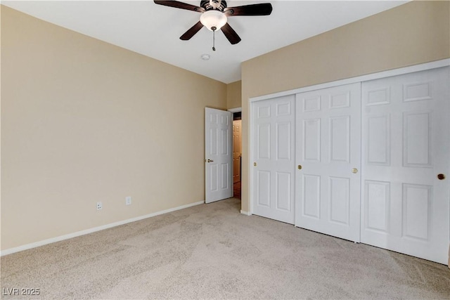 5949 Casa Coronado Ave, Las Vegas, NV 89131 - unfurnished bedroom with carpet flooring, baseboards, a closet, and a ceiling fan