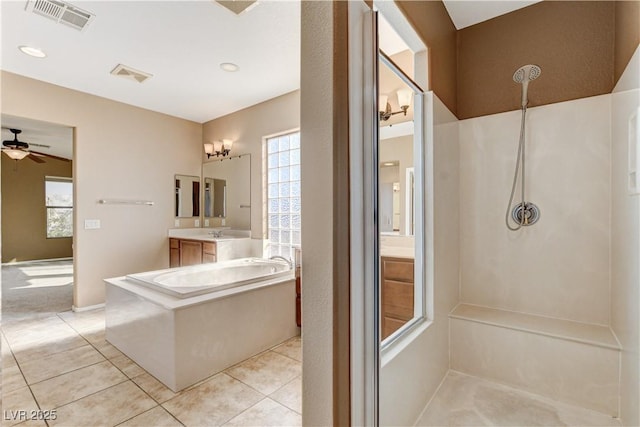 5949 Casa Coronado Ave, Las Vegas, NV 89131 - full bath with ceiling fan, a walk in shower, vanity, a bath, and tile patterned flooring