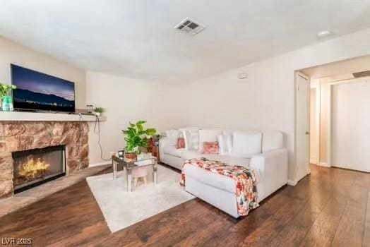 904 Boulder Springs Dr Unit 102, Las Vegas, NV 89128 - living room with wood finished floors and a fireplace