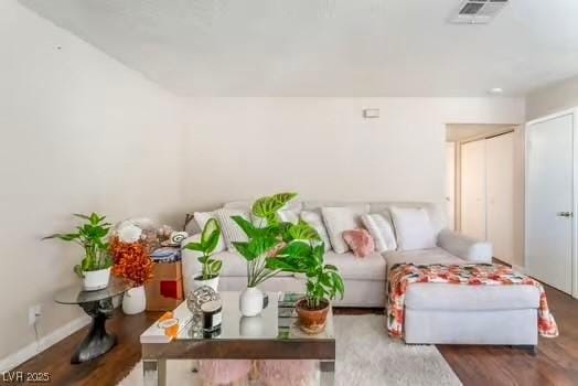 904 Boulder Springs Dr Unit 102, Las Vegas, NV 89128 - living room with wood finished floors and baseboards