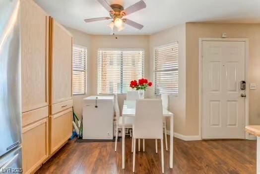 904 Boulder Springs Dr Unit 102, Las Vegas, NV 89128 - dining area with wood finished floors and ceiling fan
