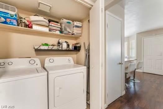 904 Boulder Springs Dr Unit 102, Las Vegas, NV 89128 - washroom featuring washer and dryer and dark wood-type flooring