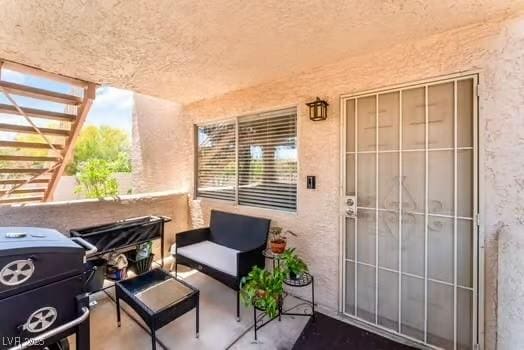 904 Boulder Springs Dr Unit 102, Las Vegas, NV 89128 - view of patio with a grill
