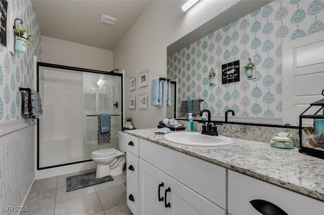 4519 Sapphire Moon Ave, North Las Vegas, NV 89084 - full bath with toilet, vanity, a stall shower, wallpapered walls, and tile patterned floors