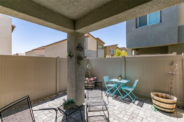 4519 Sapphire Moon Ave, North Las Vegas, NV 89084 - fenced backyard with a patio area and outdoor dining space