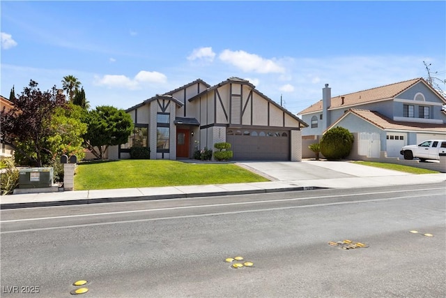 7221 W Washington Ave, Las Vegas, NV 89128 - tudor home with concrete driveway, an attached garage, stucco siding, and a front lawn