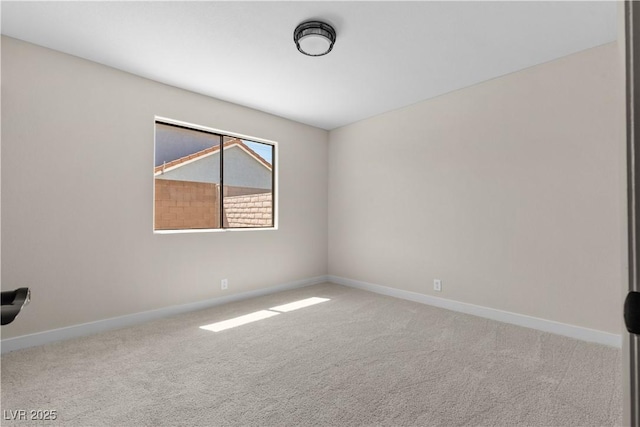 7221 W Washington Ave, Las Vegas, NV 89128 - carpeted spare room featuring baseboards