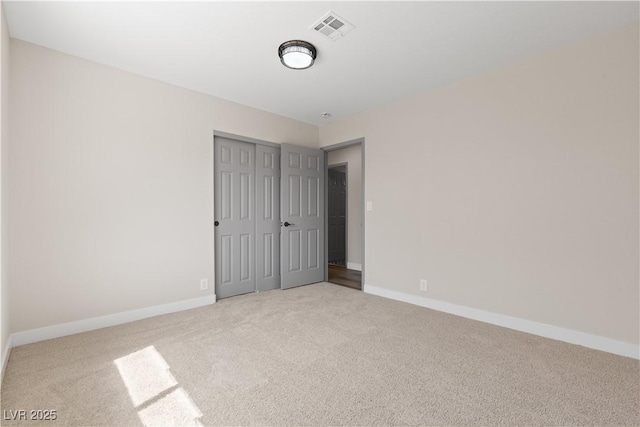 7221 W Washington Ave, Las Vegas, NV 89128 - carpeted spare room featuring baseboards
