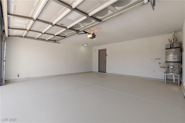 7221 W Washington Ave, Las Vegas, NV 89128 - garage featuring strapped water heater and a garage door opener