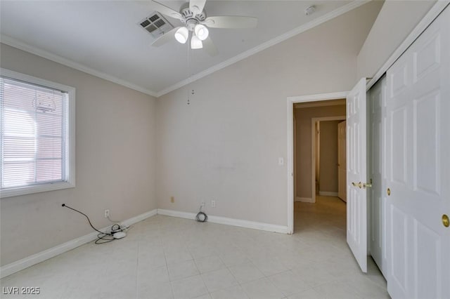 259 Baring Cross St, Henderson, NV 89074 - unfurnished bedroom with baseboards, crown molding, a closet, a ceiling fan, and light tile patterned floors