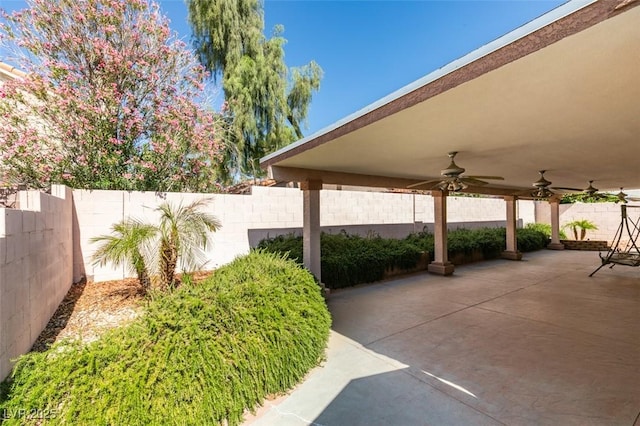 259 Baring Cross St, Henderson, NV 89074 - fenced backyard with a ceiling fan and a patio area
