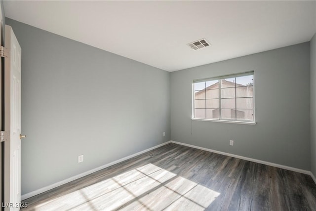 5133 Burr Oak Dr, Las Vegas, NV 89130 - empty room with wood finished floors and baseboards