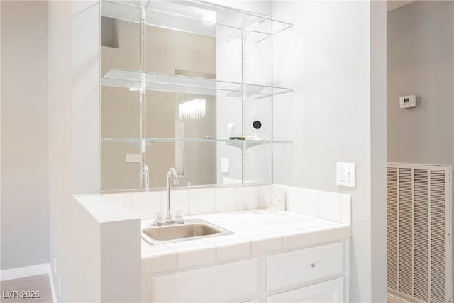 5133 Burr Oak Dr, Las Vegas, NV 89130 - bathroom featuring a heating unit and vanity