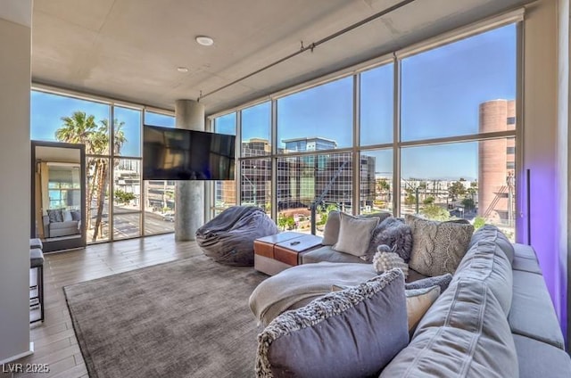 353 E Bonneville Ave Unit 379, Las Vegas, NV 89101 - living room with expansive windows and wood finished floors