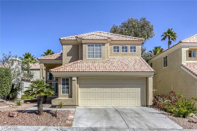 1833 Winners Cup Dr, Las Vegas, NV 89117 - view of front of home featuring a tiled roof, driveway, stucco siding, and an attached garage