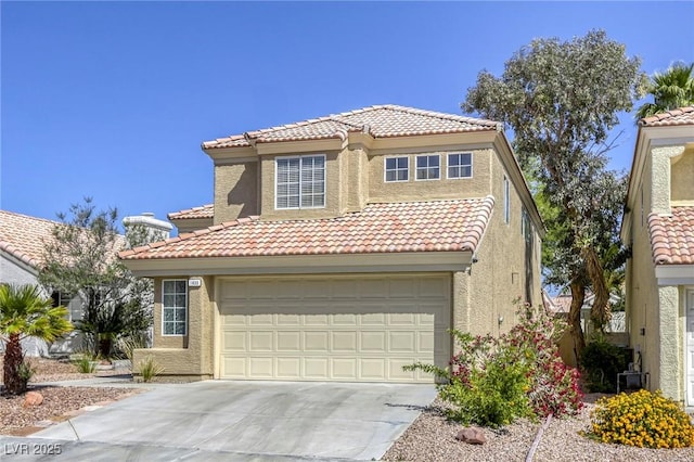 1833 Winners Cup Dr, Las Vegas, NV 89117 - mediterranean / spanish-style home featuring a tile roof, driveway, and stucco siding