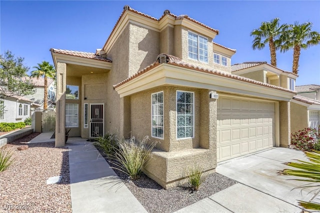1833 Winners Cup Dr, Las Vegas, NV 89117 - mediterranean / spanish-style house featuring stucco siding and a tile roof