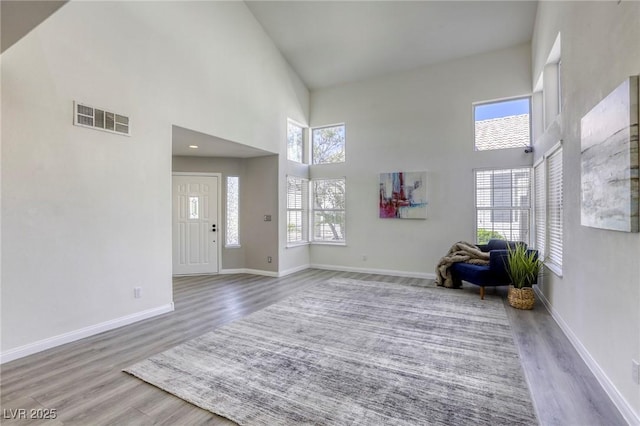 1833 Winners Cup Dr, Las Vegas, NV 89117 - entryway with a high ceiling, wood finished floors, and baseboards