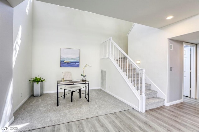 1833 Winners Cup Dr, Las Vegas, NV 89117 - staircase featuring wood finished floors, baseboards, and recessed lighting