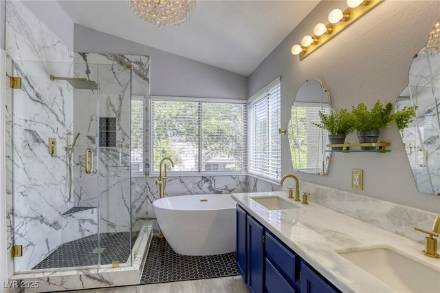 1833 Winners Cup Dr, Las Vegas, NV 89117 - full bath with vaulted ceiling, a marble finish shower, a freestanding bath, double vanity, and tile walls