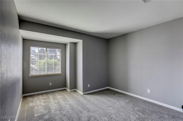 1833 Winners Cup Dr, Las Vegas, NV 89117 - spare room with carpet flooring and baseboards