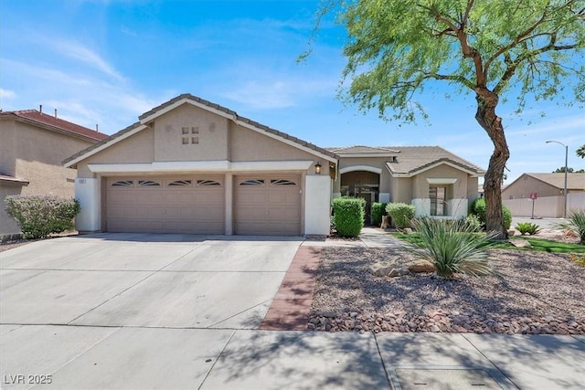 1763 Crystal Stream Ave, Henderson, NV 89012 - view of front of house with driveway, a garage, and stucco siding