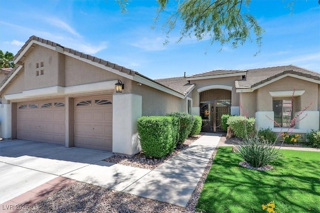 1763 Crystal Stream Ave, Henderson, NV 89012 - ranch-style house with a garage, stucco siding, driveway, a tiled roof, and a front yard