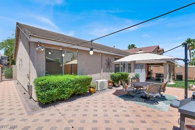 1763 Crystal Stream Ave, Henderson, NV 89012 - view of patio / terrace featuring outdoor dining area and a gazebo