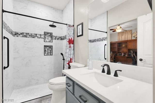 1763 Crystal Stream Ave, Henderson, NV 89012 - bathroom featuring a shower stall, vanity, toilet, and a ceiling fan