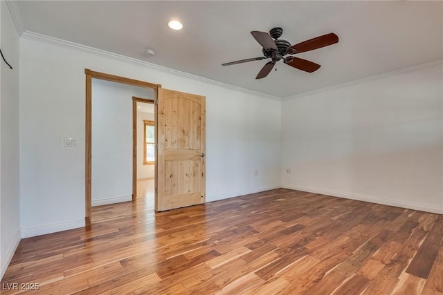 7950 Red Barn Dr, Las Vegas, NV 89123 - unfurnished room with light wood finished floors, a ceiling fan, crown molding, baseboards, and a smoke detector