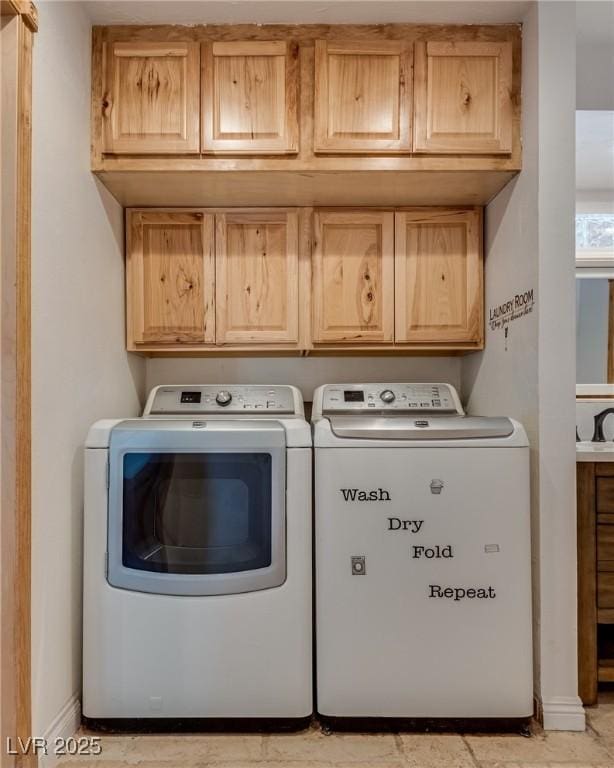 7950 Red Barn Dr, Las Vegas, NV 89123 - washroom featuring cabinet space, washing machine and clothes dryer, and baseboards