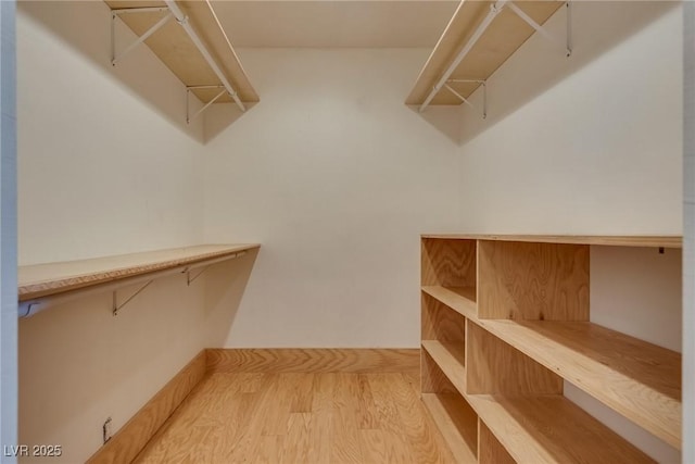 7950 Red Barn Dr, Las Vegas, NV 89123 - spacious closet with light wood-style flooring