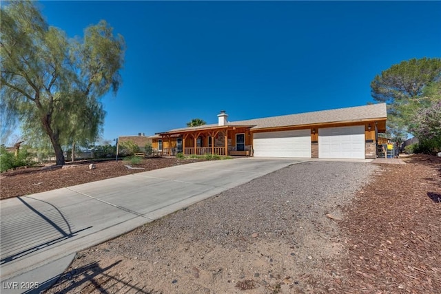 7950 Red Barn Dr, Las Vegas, NV 89123 - ranch-style home featuring covered porch, driveway, and an attached garage