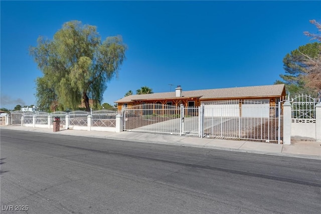 7950 Red Barn Dr, Las Vegas, NV 89123 - ranch-style home with a fenced front yard and a gate