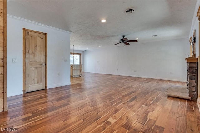 7950 Red Barn Dr, Las Vegas, NV 89123 - unfurnished living room featuring a ceiling fan, light wood finished floors, recessed lighting, baseboards, and crown molding