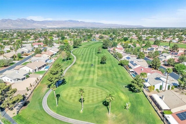 5216 Desert Star Dr, Las Vegas, NV 89130 - aerial view of property and surrounding area with nearby suburban area, mountains, and a golf club
