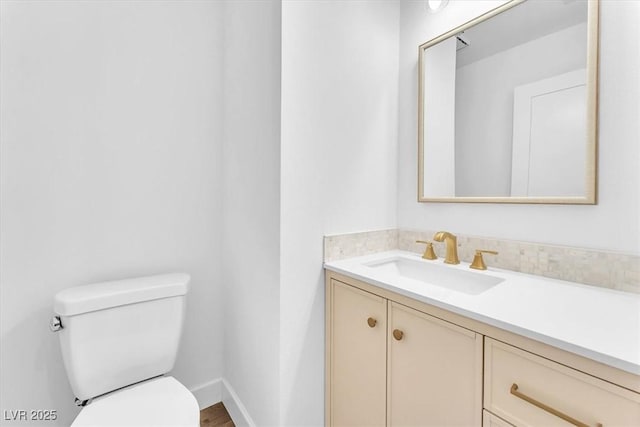 5216 Desert Star Dr, Las Vegas, NV 89130 - half bath with toilet, vanity, and baseboards