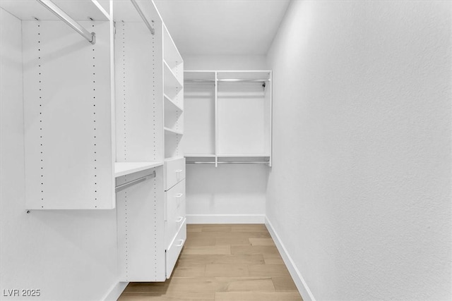 5216 Desert Star Dr, Las Vegas, NV 89130 - walk in closet featuring light wood-style floors