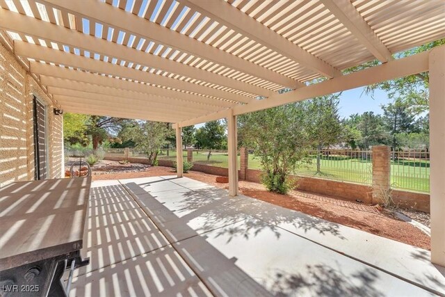5216 Desert Star Dr, Las Vegas, NV 89130 - fenced backyard featuring a patio area and a pergola