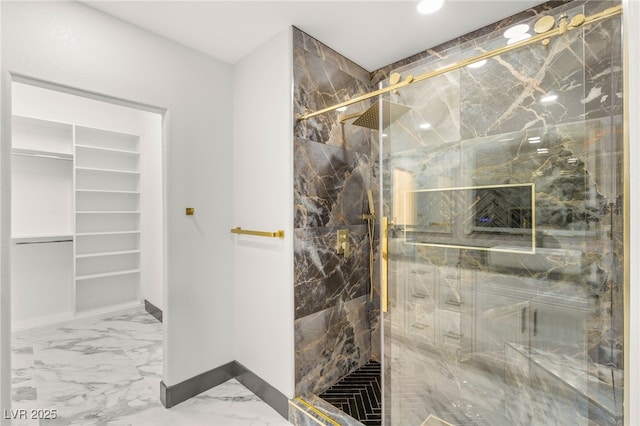 1616 Shadow Rock Dr, Las Vegas, NV 89117 - bathroom with a marble finish shower, marble finish flooring, baseboards, a walk in closet, and recessed lighting